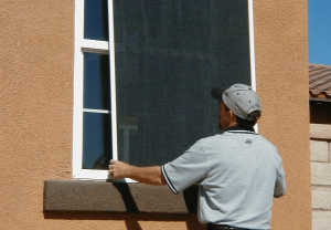 Person Installing window sunshade